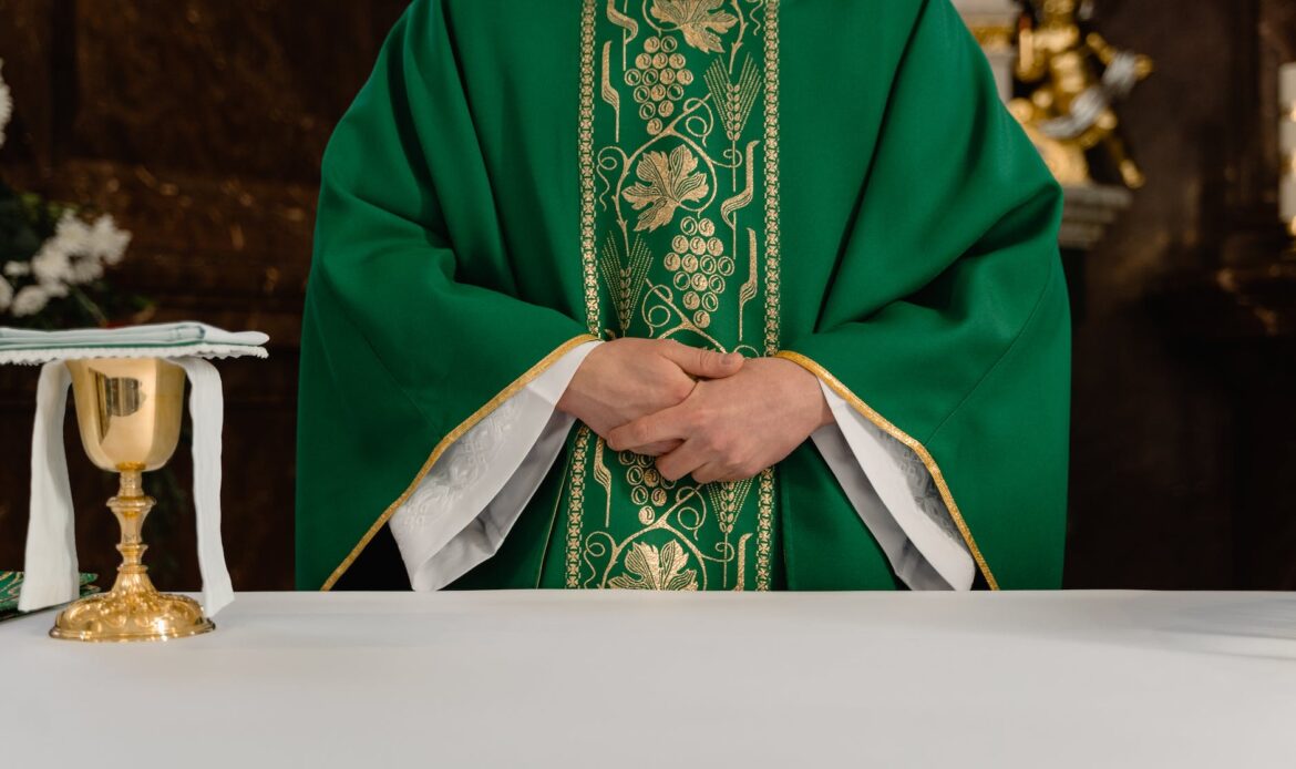 a priest wearing green stole